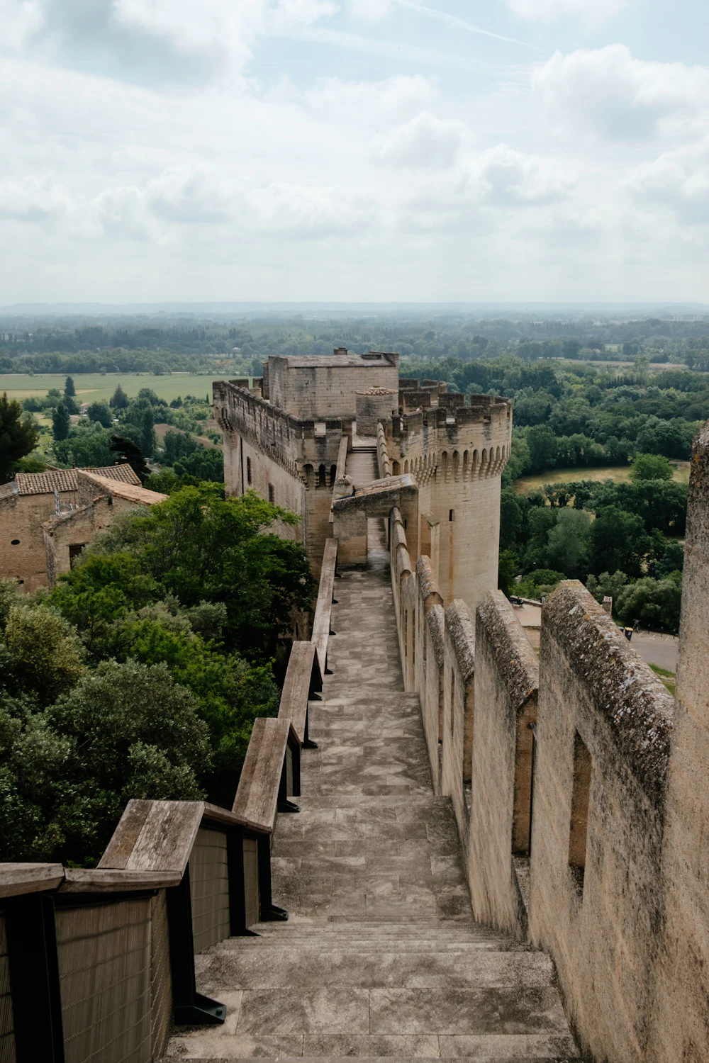 Stone stairway along the ramparts of Fort Saint-André in Villeneuve-lès-Avignon, overlooking the valley